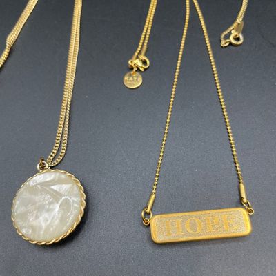 Sale Photo Thumbnail #149: Gold tone necklaces with pendants