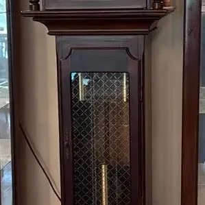 Traditional Grandfather Clock with Ornate Brass Dial, Moon Phase Arch & Dark Wood Case