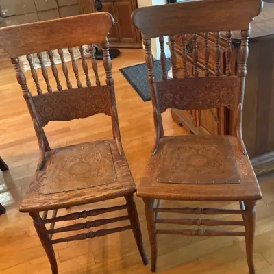Pair of Antique Oak Spindle Back Dining Chairs with Embossed Leather Seats & Carved Details