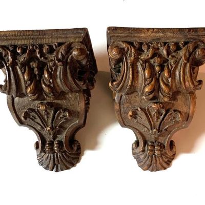 Pr. of antique carved oak corbels