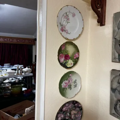 Sale Photo Thumbnail #2: Collection of four decorative porcelain floral plates