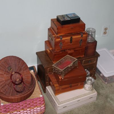 Sale Photo Thumbnail #82: Assortment of vintage decorative wooden boxes, woven baskets, glass jars, and small storage containers displayed on the floor.