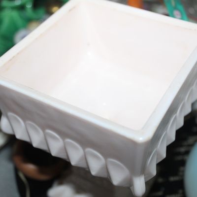Sale Photo Thumbnail #58: Vintage white milk glass square planter with textured decorative detailing around the outer rim.