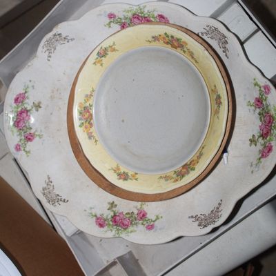 Sale Photo Thumbnail #108: Stack of vintage floral porcelain serving dishes and plates featuring scalloped edges and pink and yellow rose patterns.