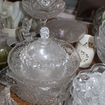 Sale Photo Thumbnail #21: Collection of vintage pressed and cut glass tableware, including a covered candy dish, pedestal bowls, and serving platters.