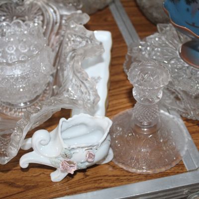 Sale Photo Thumbnail #8: Collection of vintage glass and porcelain items, including a clear pressed glass candlestick holder, ruffled bowls, and a small white porcelain floral creamer.