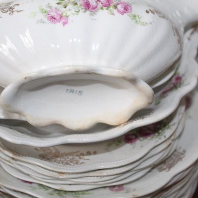 Sale Photo Thumbnail #14: Vintage white porcelain gravy boat and matching dishes with pink floral transferware patterns, gold trim, and an 'IRIS' maker's stamp on the underside.