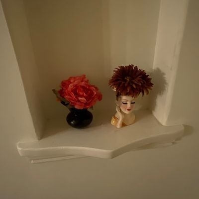 Sale Photo Thumbnail #9: Lady head vase and full glass xase with faux flowers
