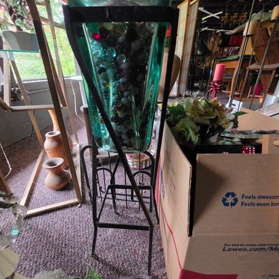 Sale Photo Thumbnail #214: Mid-Century Modern Green Glass Vase in Wrought Iron Stand