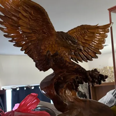 Sale Photo Thumbnail #6: Vintage hand carved wooden eagle sculpture