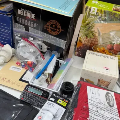 Assorted household goods, cookware, and hardware including a Belgique cookware set box, glass divided serving dishes, an Andersen storm...