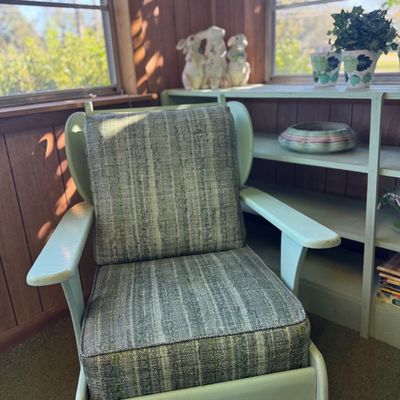 Sale Photo Thumbnail #36: Vintage painted wooden armchair with light green frame and textured green tweed-style cushions.