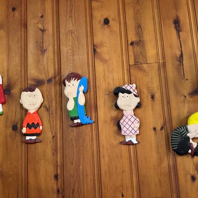 Sale Photo Thumbnail #9: Set of vintage Peanuts character wooden wall plaques, featuring Snoopy, Charlie Brown, Linus, Lucy, and Schroeder.