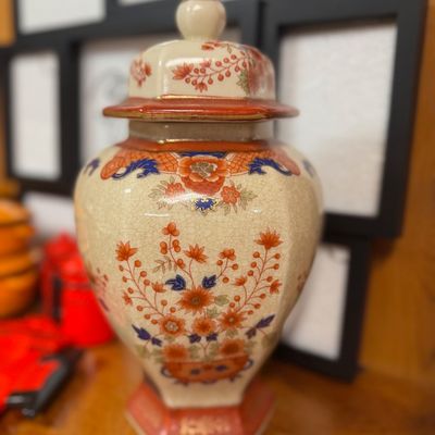 Sale Photo Thumbnail #52: Vintage Japanese Satsuma-style crackle glaze porcelain ginger jar with hand-painted floral motifs and gold accents.