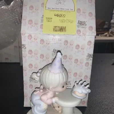 Enesco Precious Moments 'May Your Every Wish Come True' porcelain figurine, complete with its original box.