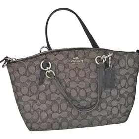 Coach Signature Jacquard tote bag in dark grey and black with leather trim and silver-tone hardware.