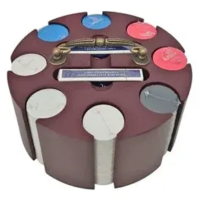 Vintage rotating wooden poker chip carousel with metal carrying handle, complete with plastic poker chips and two decks of playing cards.