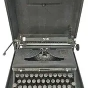 Vintage Royal portable typewriter in a original black hard carrying case.