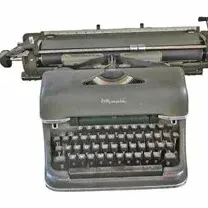 Vintage Olympia SG1 manual desktop typewriter with a wide carriage in dark green metal housing.