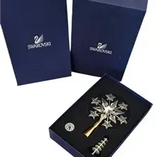 Swarovski crystal tree topper ornament set, complete with original blue presentation box and packaging.