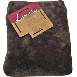 Folded brown plush luxury throw blanket with original retail packaging tag.