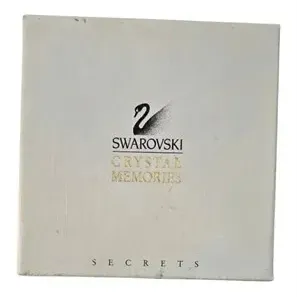 Original white Swarovski Crystal Memories Secrets presentation box with printed swan logo.