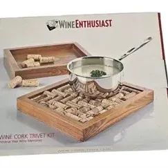 Wine Enthusiast brand wooden wine cork trivet kit in its original box.