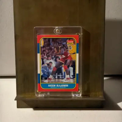 1986-87 Fleer #82 Akeem Olajuwon RC - Houston Rockets HOF - Copy A (Single Card)
