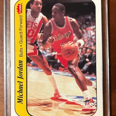 1986-87 Fleer Basketball Michael Jordan Sticker #8 - Bulls HOF Rookie in One-Touch  