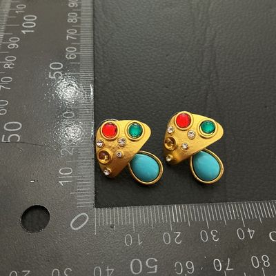 Sale Photo Thumbnail #197: Pair of gold-tone mushroom-shaped stud earrings featuring colorful faux cabochons (red, green, and turquoise blue) and clear rhinestone accents. Post-back design. Each earring measures approximately 25 mm tall by 20 mm wide. In good pre-owned condition wi