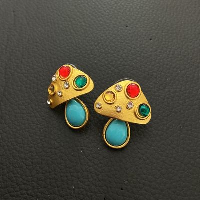 Sale Photo Thumbnail #195: Pair of gold-tone mushroom-shaped stud earrings featuring colorful faux cabochons (red, green, and turquoise blue) and clear rhinestone accents. Post-back design. Each earring measures approximately 25 mm tall by 20 mm wide. In good pre-owned condition wi