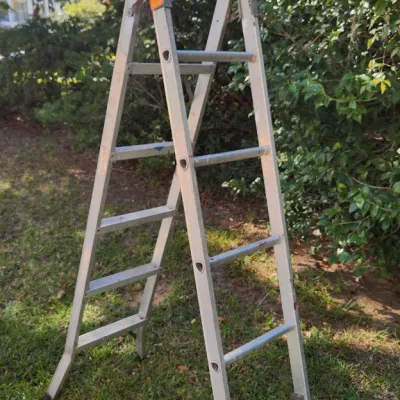 Sale Photo Thumbnail #25: Ladder rhat can be used as an extension ladder or A frame.