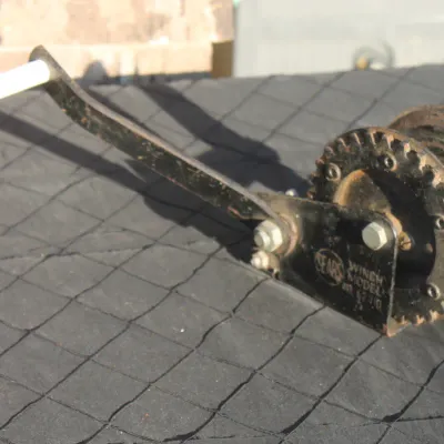 Sale Photo Thumbnail #14: Vintage Sears hand-crank boat trailer winch with black painted finish.