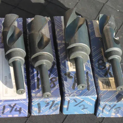 Sale Photo Thumbnail #9: Set of four Drill Master Silver & Deming high-speed steel drill bits with reduced shanks, complete with original boxes.