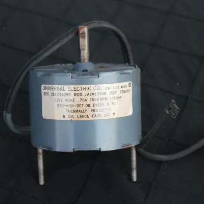Sale Photo Thumbnail #27: Vintage Universal Electric Co. small electric motor, model JA2M199N, 1/60 HP, featuring original specifications label and attached wiring.