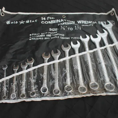 Sale Photo Thumbnail #51: Gold Star 14-piece combination wrench set, ranging from 1/4" to 1 1/4", housed in a black roll-up organizer pouch.
