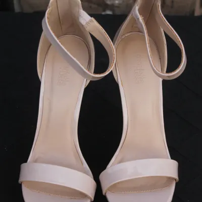 Sale Photo Thumbnail #76: Pair of Charlotte Russe pale pink patent ankle-strap high-heeled sandals with back zipper closure.