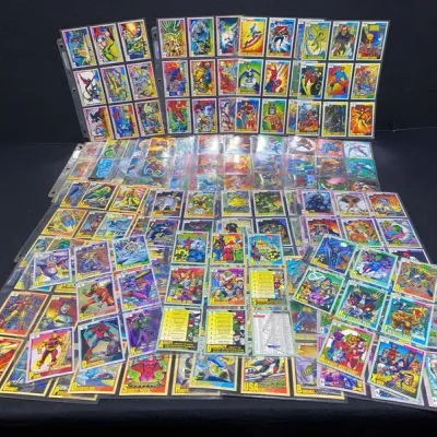 Sale Photo Thumbnail #69: Large collection of 1990s Impel Marvel Universe trading cards, displayed in plastic binder sleeve pages.