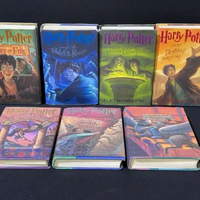 Sale Photo Thumbnail #28: Complete set of seven Harry Potter US hardcover books by J.K. Rowling, including dust jackets with original Mary GrandPré illustrations.