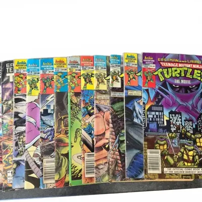 Sale Photo Thumbnail #75: Collection of Teenage Mutant Ninja Turtles comic books, including Archie Adventure Series and movie adaptation issues from the late 1980s and early 1990s.