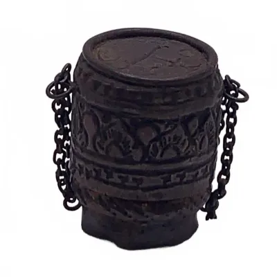 Sale Photo Thumbnail #19: Antique carved dark wood or cast metal miniature barrel-shaped vessel with intricate relief patterns and hanging side chains.
