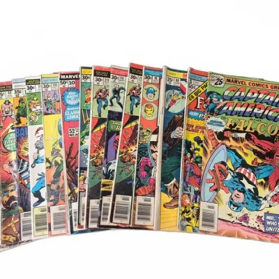 Sale Photo Thumbnail #65: Collection of Bronze Age Marvel comic books fan-spread, including Captain America #199 and various Western and superhero titles from the 1970s.