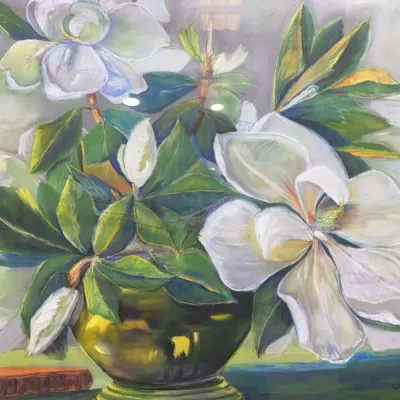 Sale Photo Thumbnail #84: Framed floral still life painting depicting white magnolias in a brass vase alongside a book, signed in the lower right corner.
