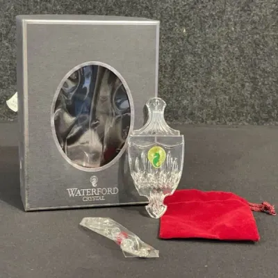 Sale Photo Thumbnail #85: Waterford Crystal glass ornament with original presentation box, red velvet storage pouch, and hanging ribbon.