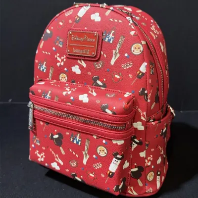 Sale Photo Thumbnail #92: Disney Parks x Loungefly red mini backpack featuring an all-over print of holiday sweets and park treats, with a front zip pocket and metal logo plaque.