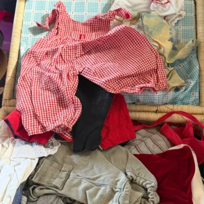 Sale Photo Thumbnail #8: Collection of vintage doll clothing and accessories.