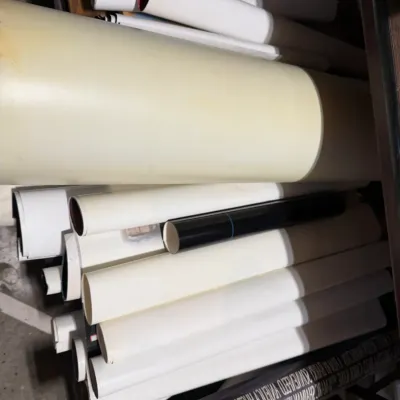 Sale Photo Thumbnail #25: Collection of rolled posters, art prints, and vinyl materials stacked together in various sizes.
