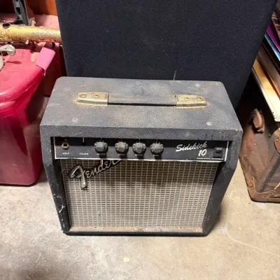 Sale Photo Thumbnail #16: Vintage Fender Sidekick 10 guitar practice amplifier with silver grille cloth, showing dusty surface wear and missing a volume knob.