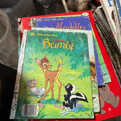 Sale Photo Thumbnail #24: Stack of vintage children's books featuring Walt Disney's Bambi Little Golden Book on top.