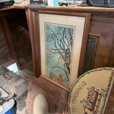 Sale Photo Thumbnail #6: Framed winter landscape print featuring bare trees and a house.